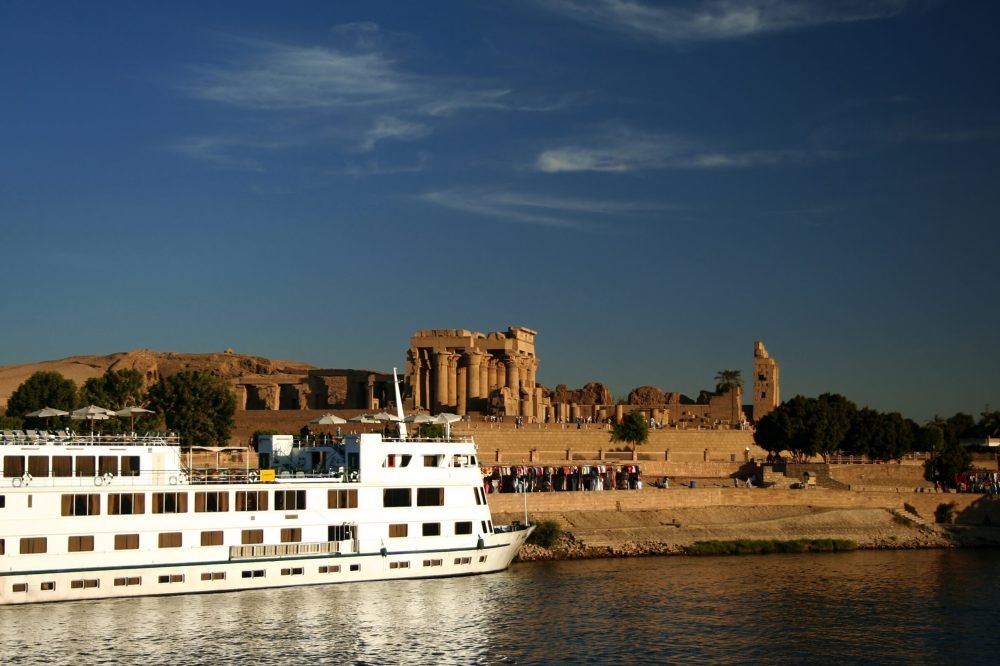 A,Nile,Cruiser,Docked,At,The,Temple,Of,Kom,Ombo